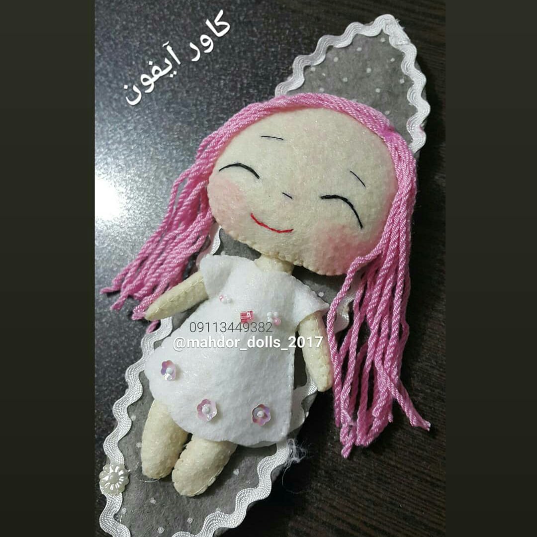 دستگیره آیفون طرح عروسک مو صورتی