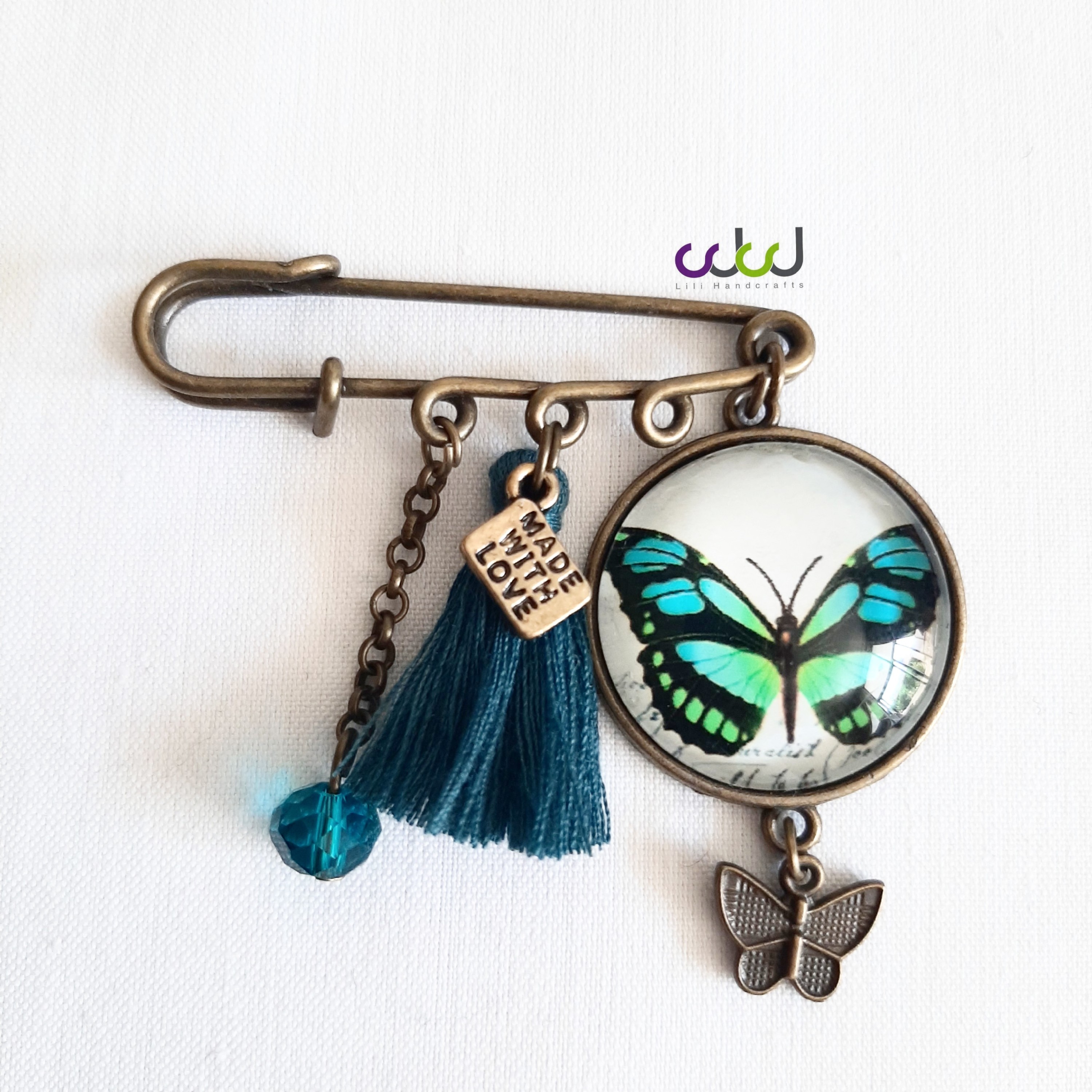 سنجاق سینه اسکاتلندی دستساز طرح پروانه سبزآبی زیورآلات زنانه ، پانچو و مانتو بافت 