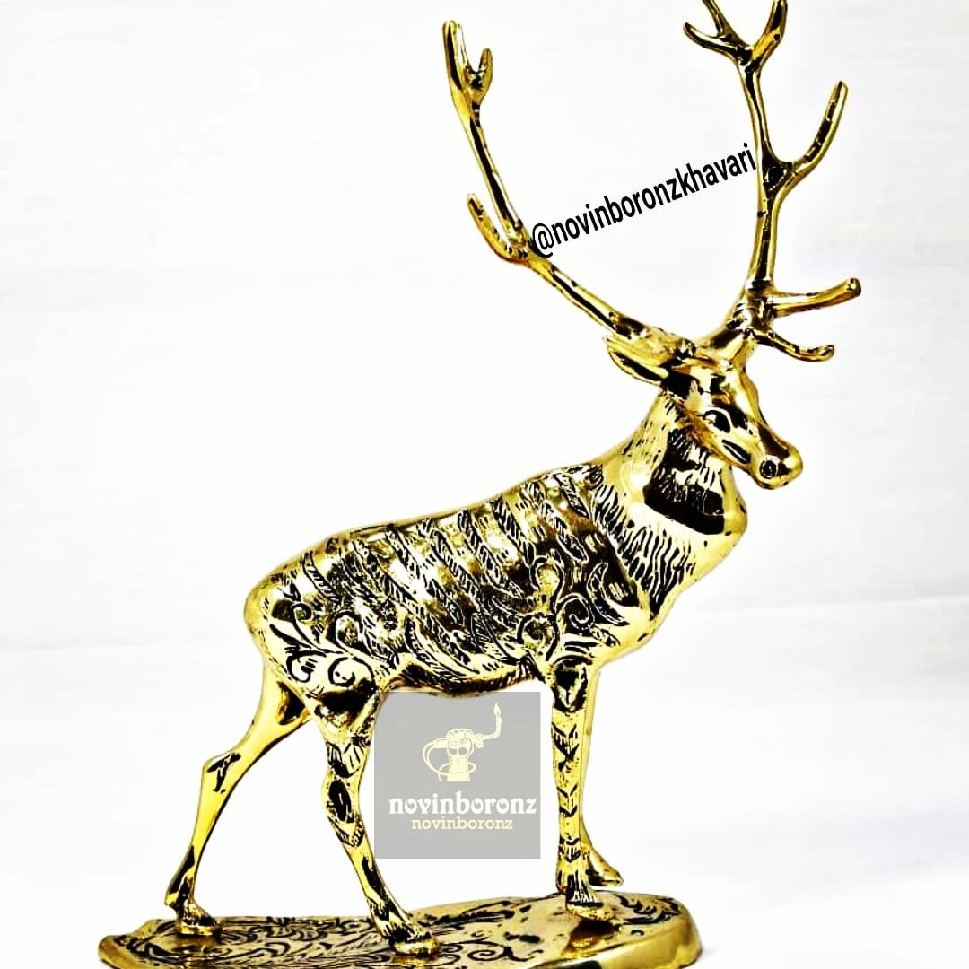 مجسمه برنزی گوزن شاخدار وزن 2300گرم .متعهد به جنس فروخته شده