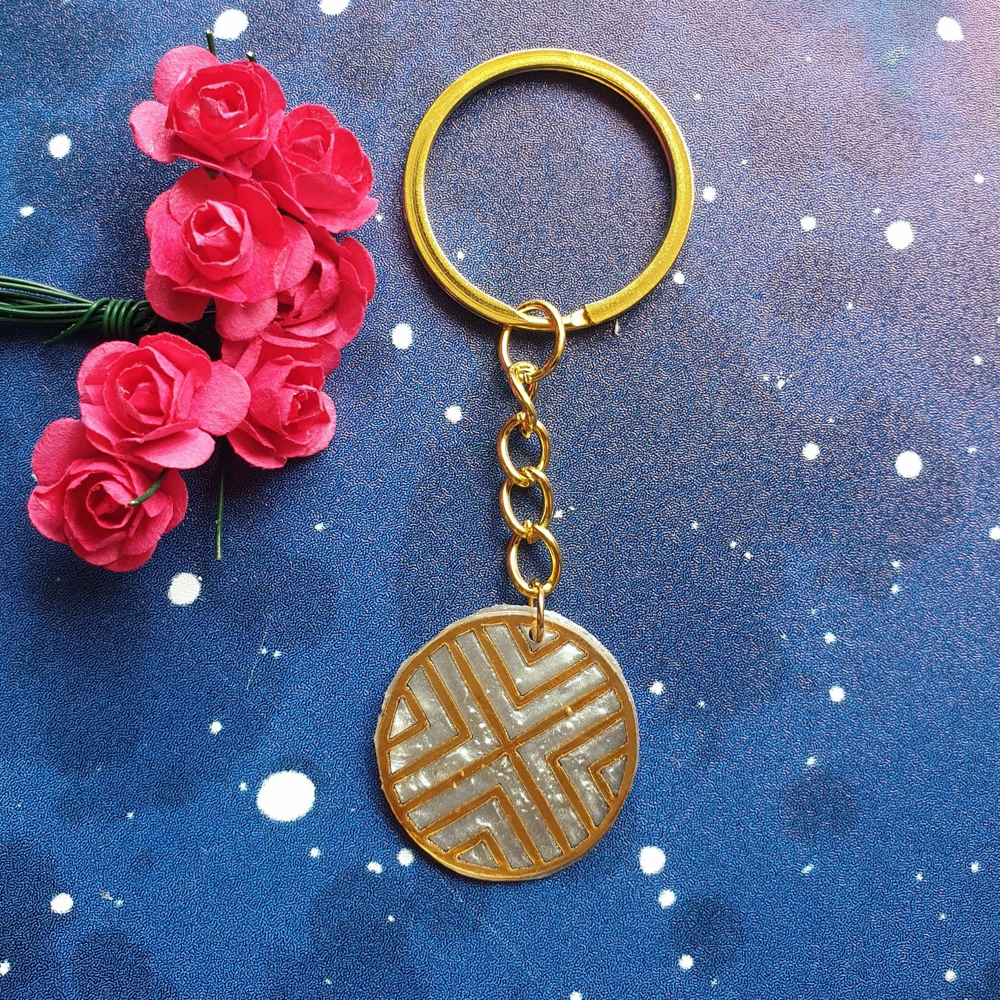 جا کلیدی  رزین طرح دار دایره ای  قطر دو نیم  سانت،،بااین قیمت تکرار ندارد
