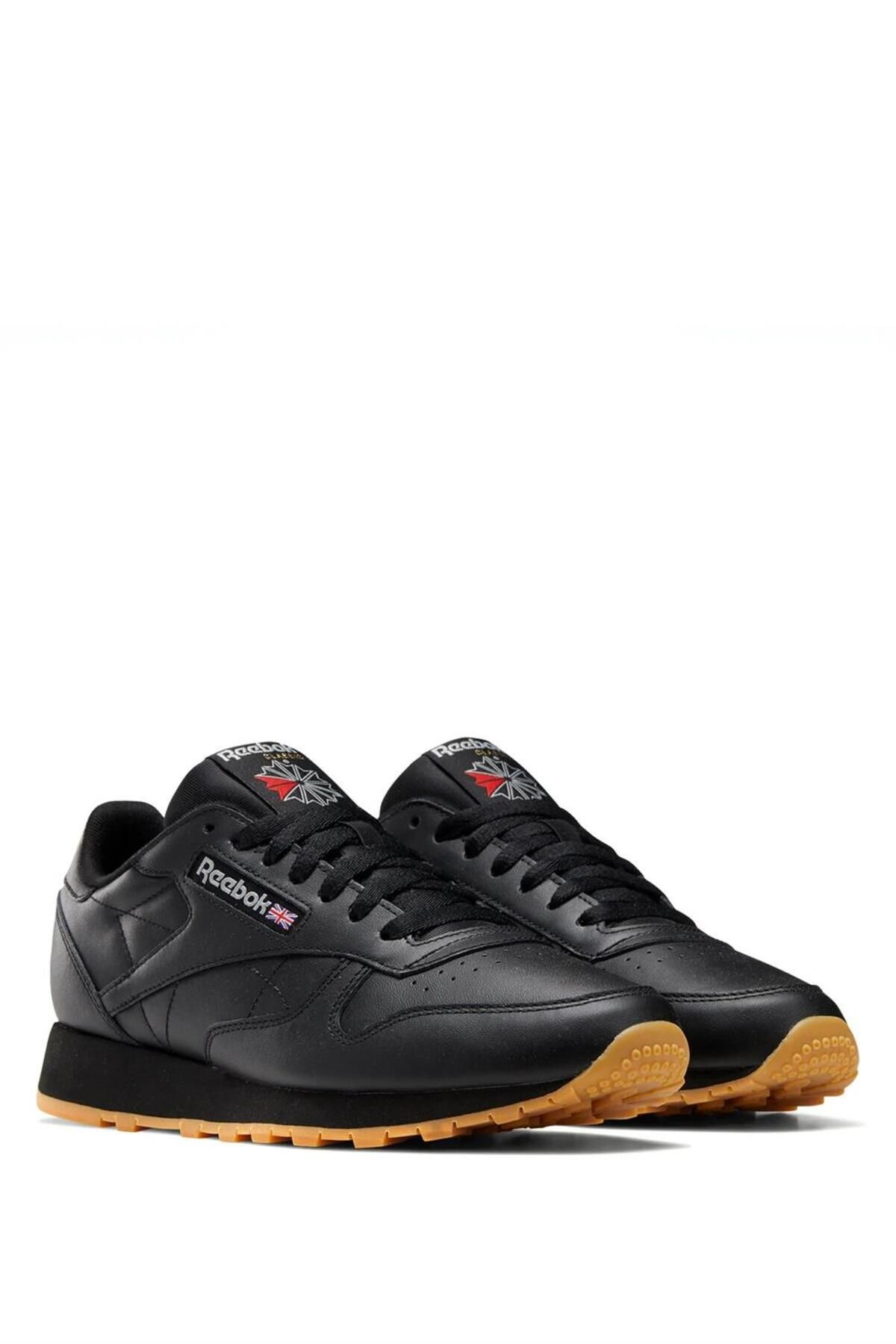 کفش دو و تمرین مشکی زنانه سیاه چرم کلاسیک 100008493 101424133 اورجینال Reebok