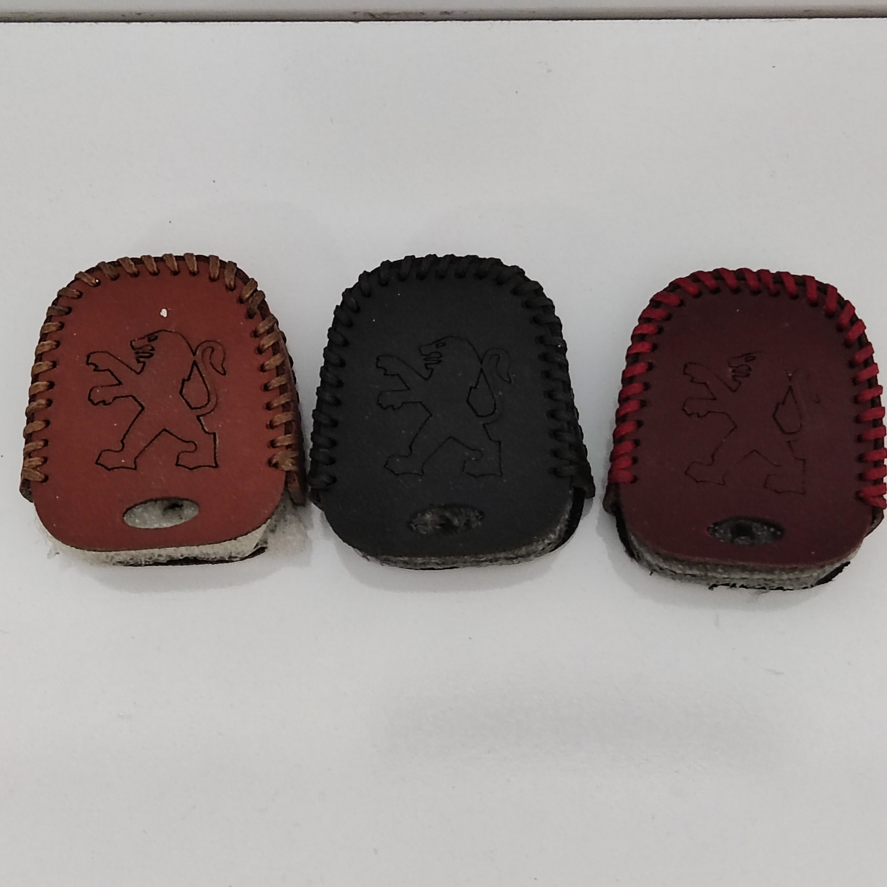 کاور چرم دوخت ریموت خودرو  پژو 206(پس کرایه) 