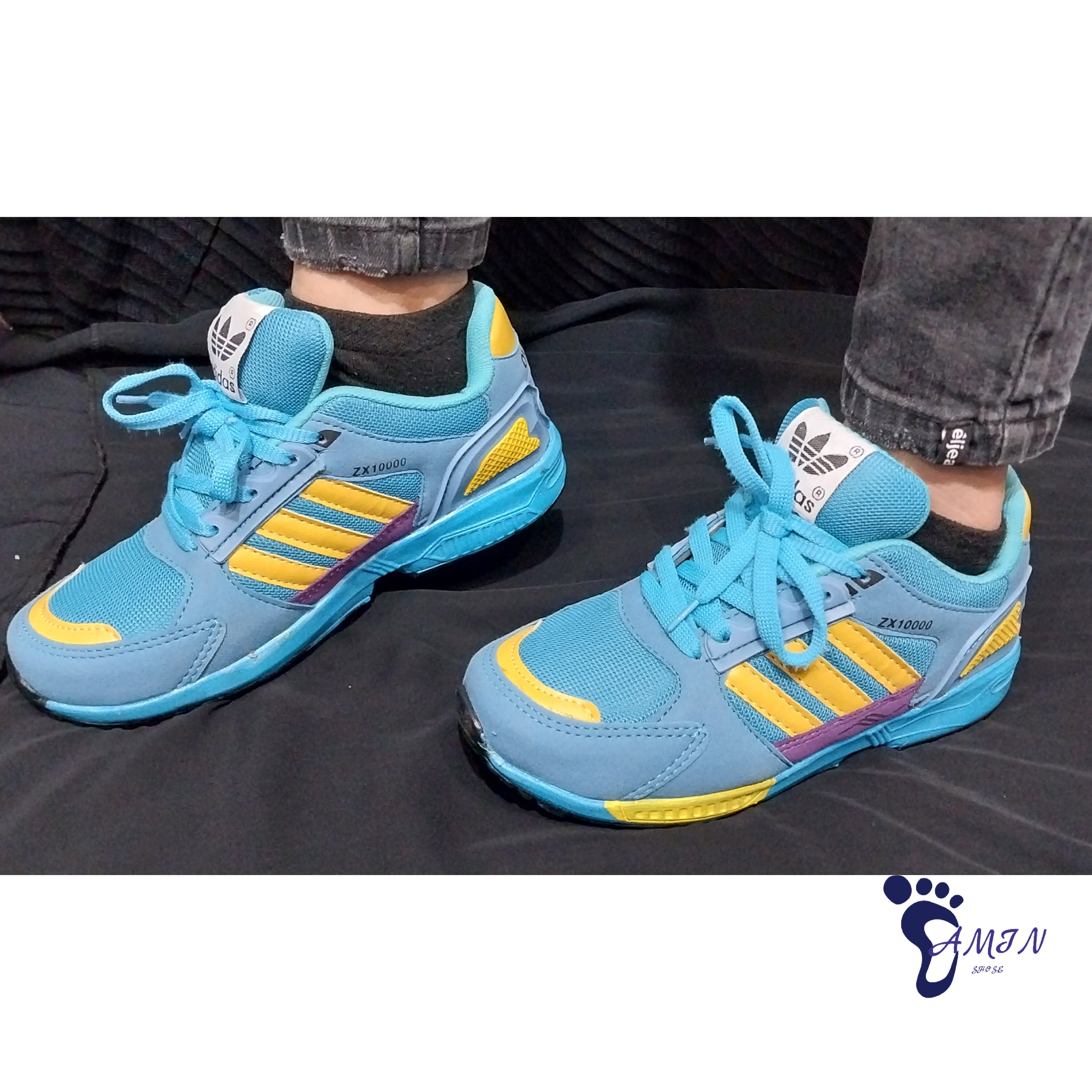 کتونی اسپرت کتونی برند ادیداس مدل زدایکس10000رنگ ابی فیروزه ای سایز36تا40



