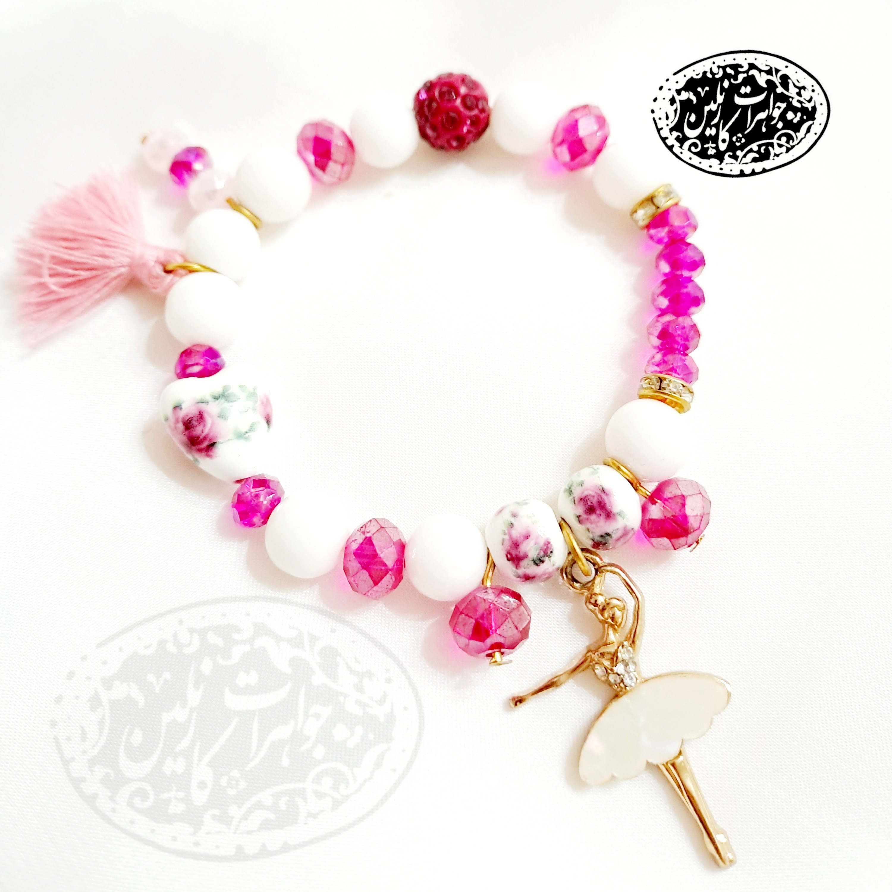 دستبند طرح بالرین صدفی با سرامیک گل سرخی