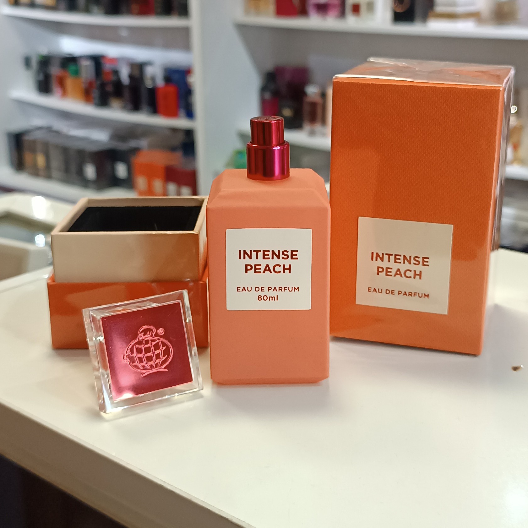 ادو پرفیوم فراگرنس ورد اینتنس پیچ Fragrance world intense peach زنانه و مردانه حجم 80 میلی لیتر