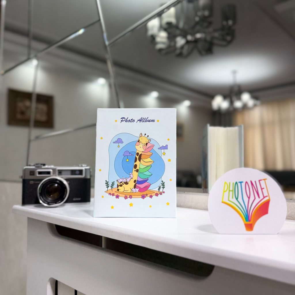 آلبوم کودک پاکتی 100 تایی 10×15 طرح زرافه