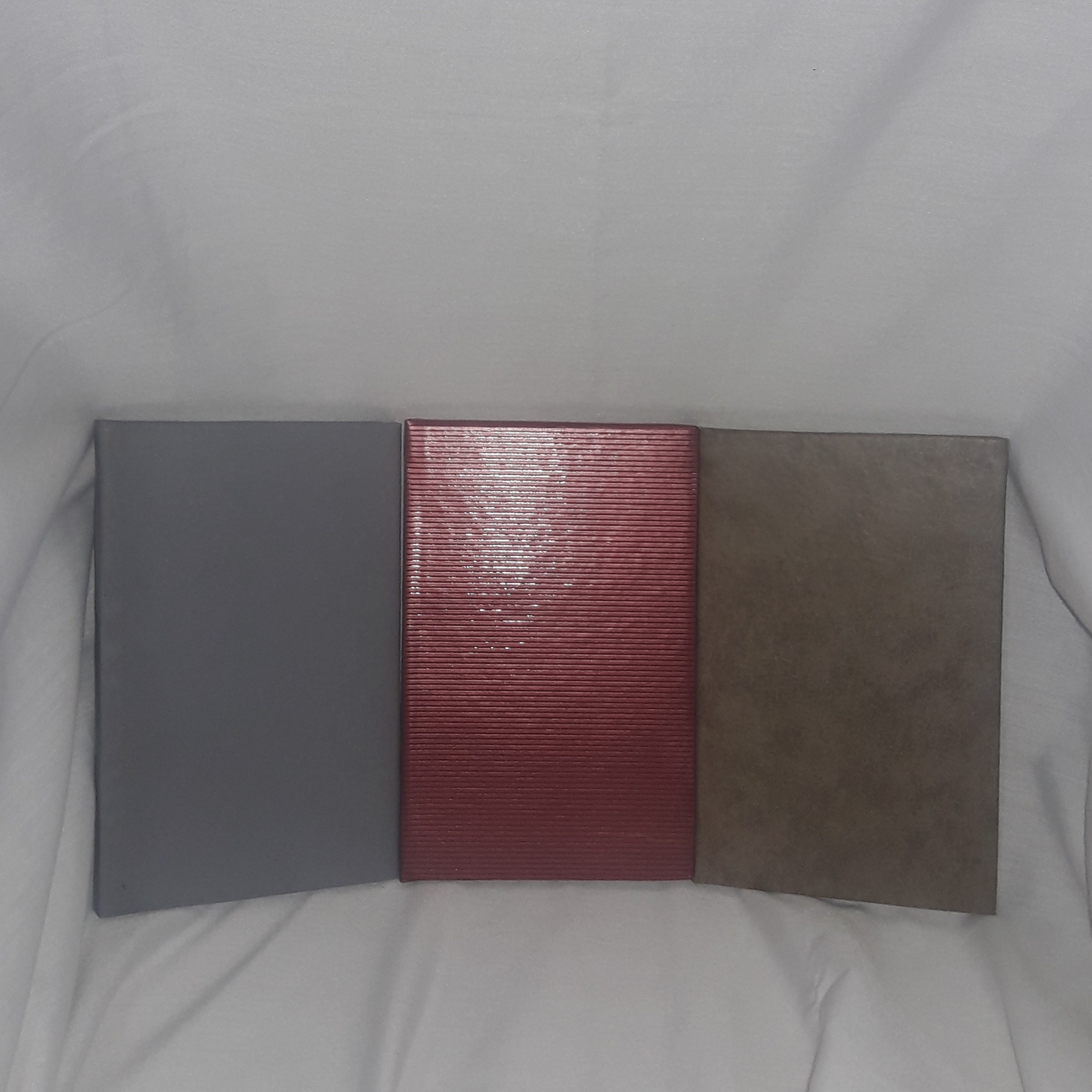 دفترچه یادداشت جلد سخت ته دوختی طرح متالیک تک رنگ سایز1.8