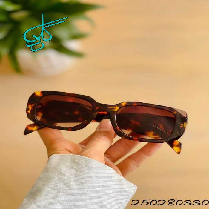 خرید عینک برند PRADA دارای استاندارد UV400 فرم کائوچو همراه کاور و دستمال کد 2415169 - ردگل