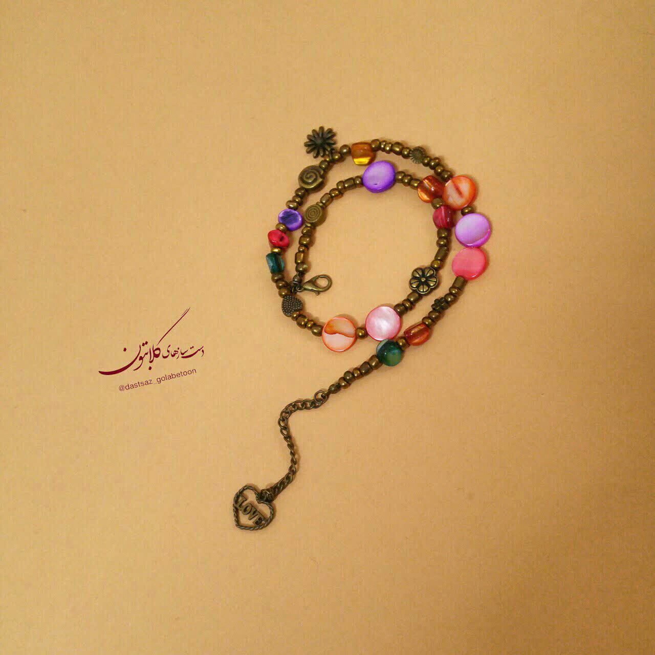 دستبند دورپیچ سنگ رنگی و برنز گلابتون
