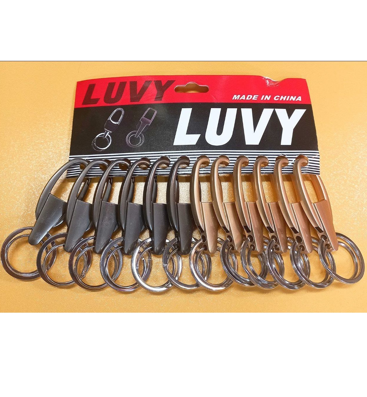 سرکلیدی کمری مشکی و طلایی بیضی