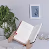 کتاب خاک آمریکا اثر جنین کامینز نشر آموت