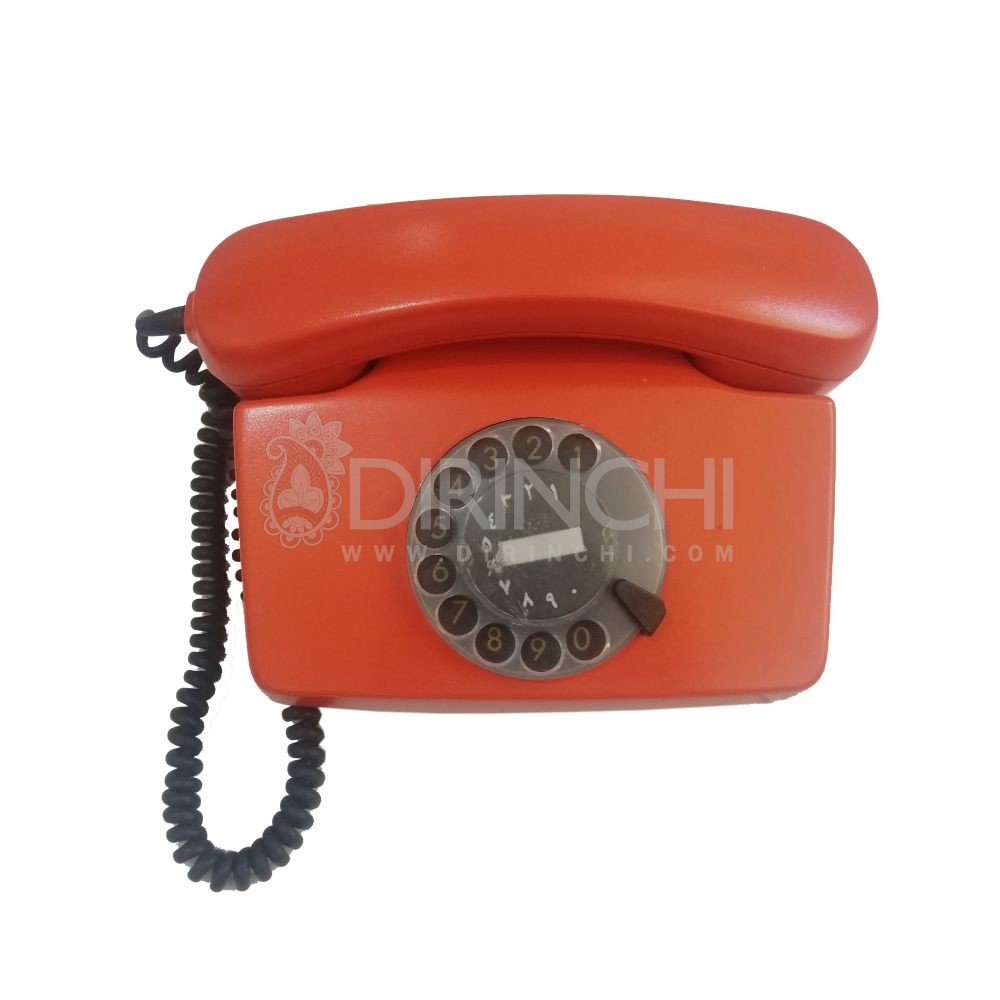 گوشی تلفن قدیمی فلکه ای نارنجی نوستالژیک
