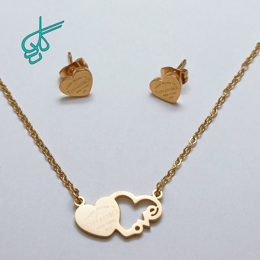 خرید نیم ست گوشواره و گردنبند طلایی طرح قلب کد 1710021 - ردگل