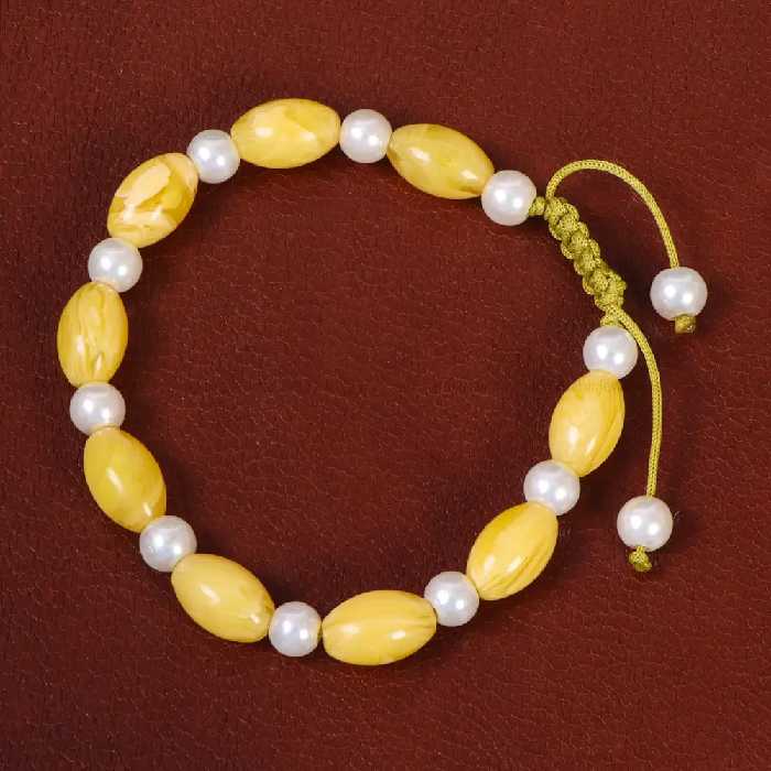 دستبند پودر کهربا با مروارید زنانه کد 26977 - جواهری مشاهیر