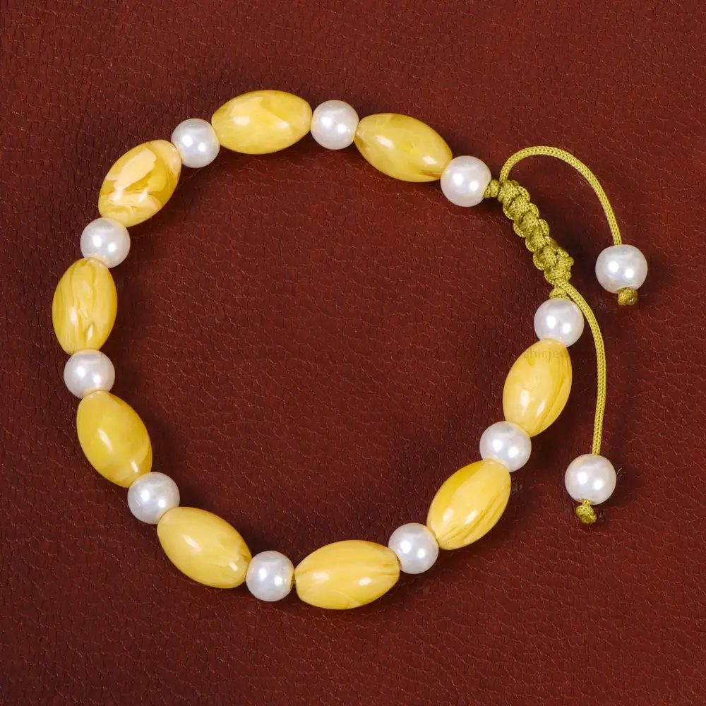 دستبند پودر کهربا با مروارید زنانه کد 26977 - جواهری مشاهیر