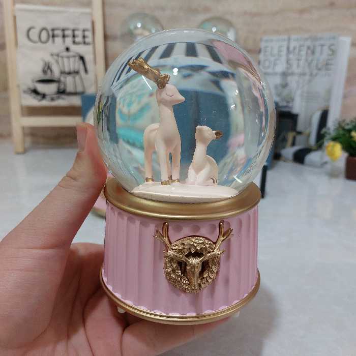 گوی موزیکال(پمپی)سایز بزرگ رقص نور و پمپ برف و چندین موزیک مختلف داره 