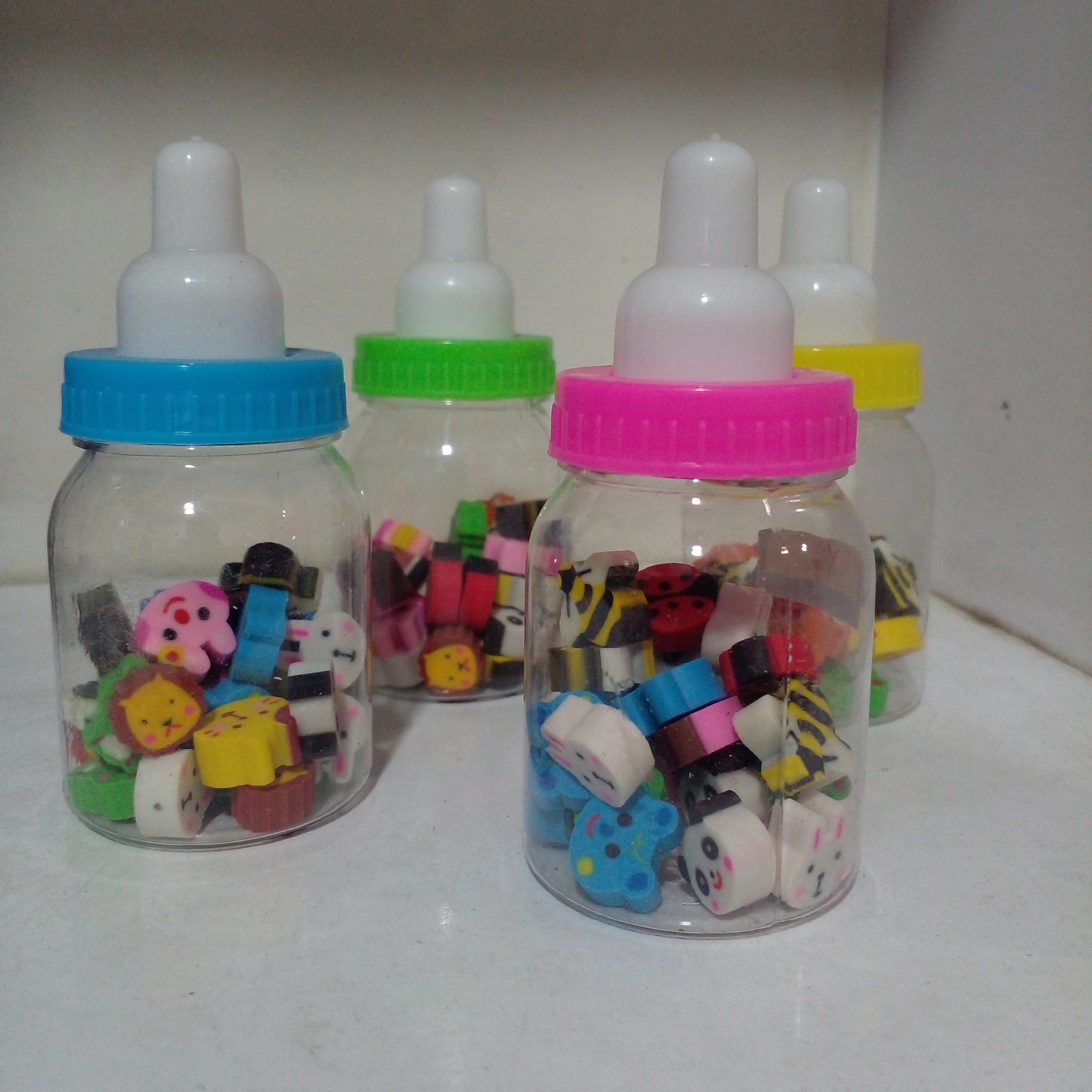 پاک کن ریز فانتزی در شکل های متنوع با بسته بندی شیشه شیر 