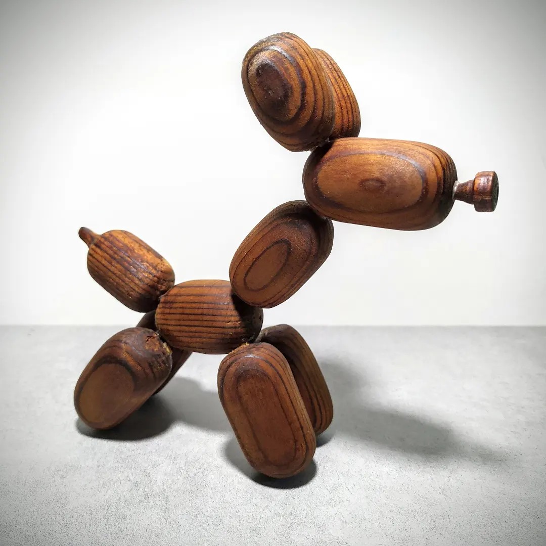 مجسمه چوبی طرح سگ بادکنکی