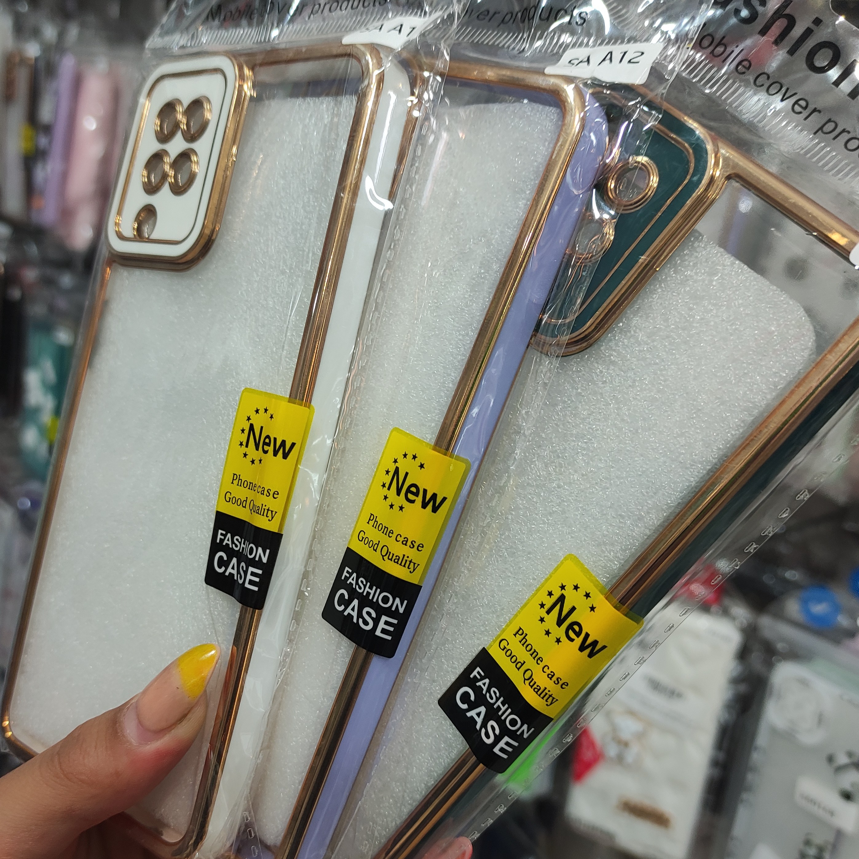 قاب گوشیa12 قاب شیشه ای محافظ لنز دار دور طلایی و رنگی اورجینال