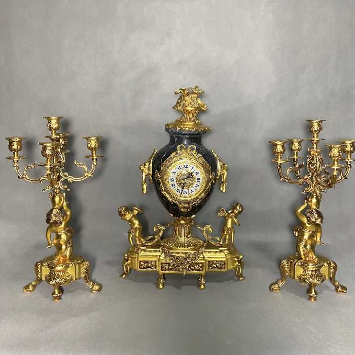 ساعت و شمعدان مشکی و طلایی برنز