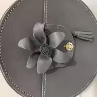 کیف زنانه خاکستری دوخته شده با چرم طبیعی مدل گرد