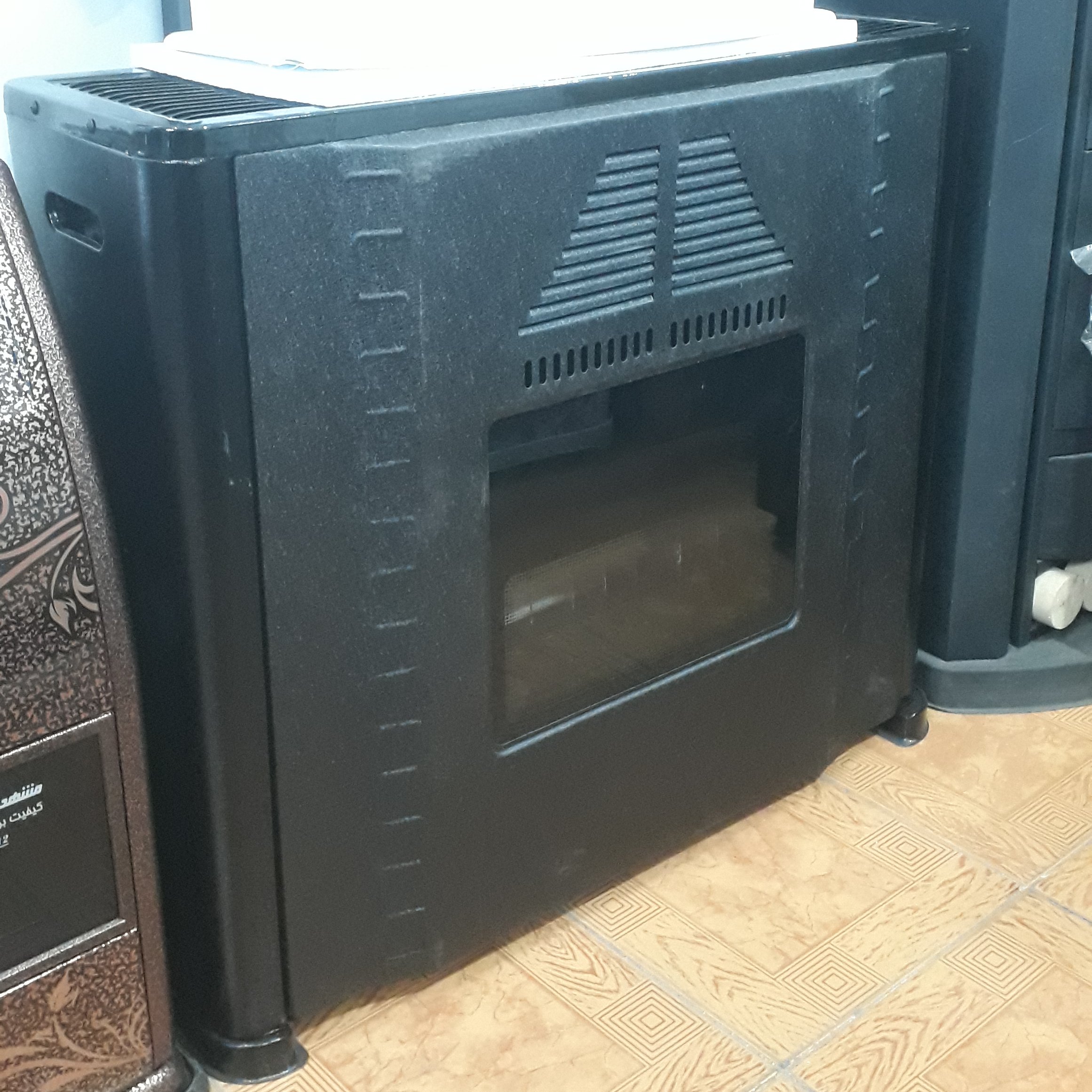 بخاری گازی جنرال مدل15000 رنگ مشکی چروک