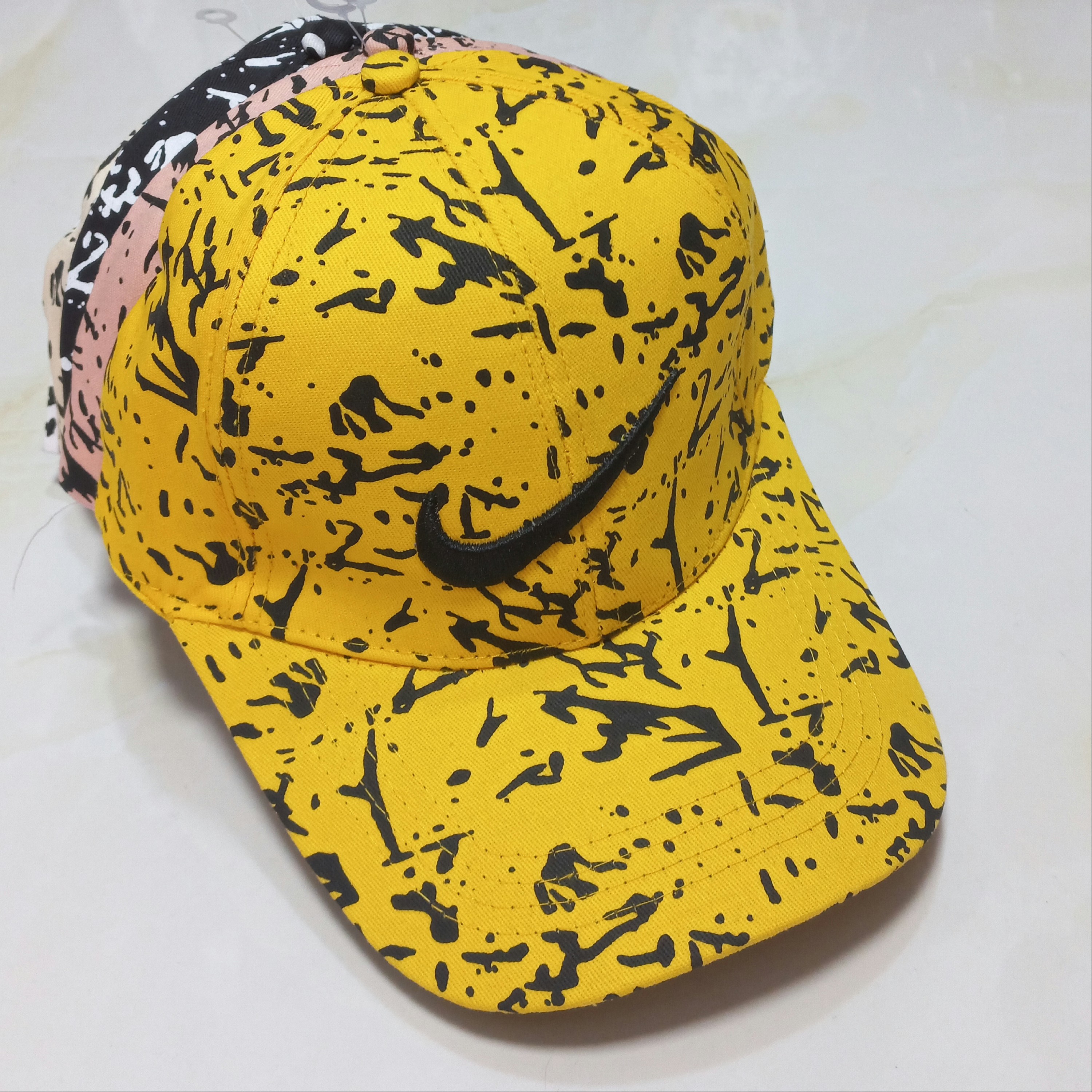 کلاه NIKE طرح دار مدل اسپورت زنانه و مردانه قابل تغییر سایر با بند سگکی پشت کار