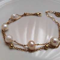 دستبند مروارید دولاین، ترکیبی از مروارید پرورشی ومتریال استیل، کاری شیک، رنگ ثابت و باکیفیت عالی 