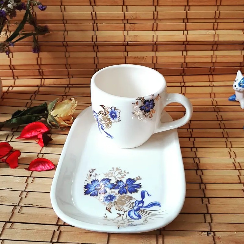 فنجان چایخوری وقهوه خوری وزیر فنجانی با گلهای آبی وطلایی ومرغ برجسته