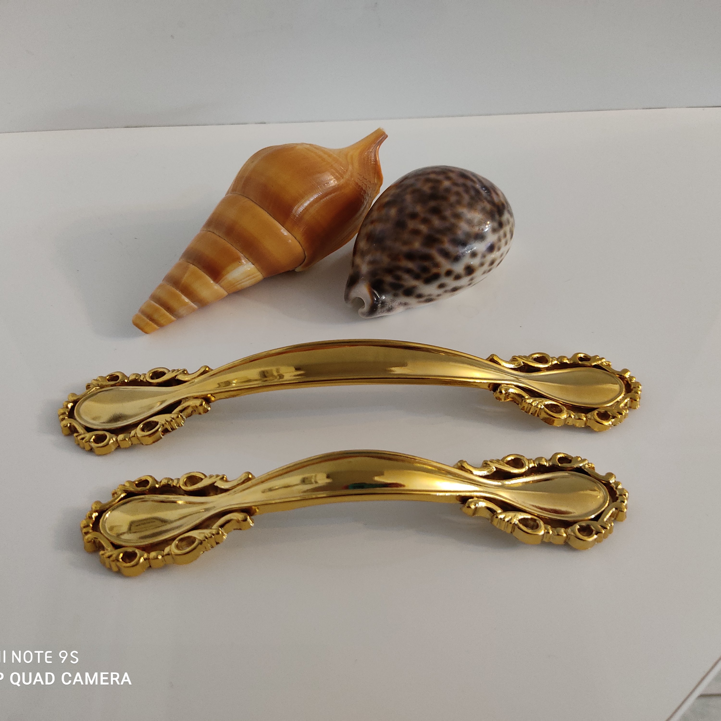 دستگیره کابینت مدل خورشیدی طلایی سایز 128 جنس سرب توپر