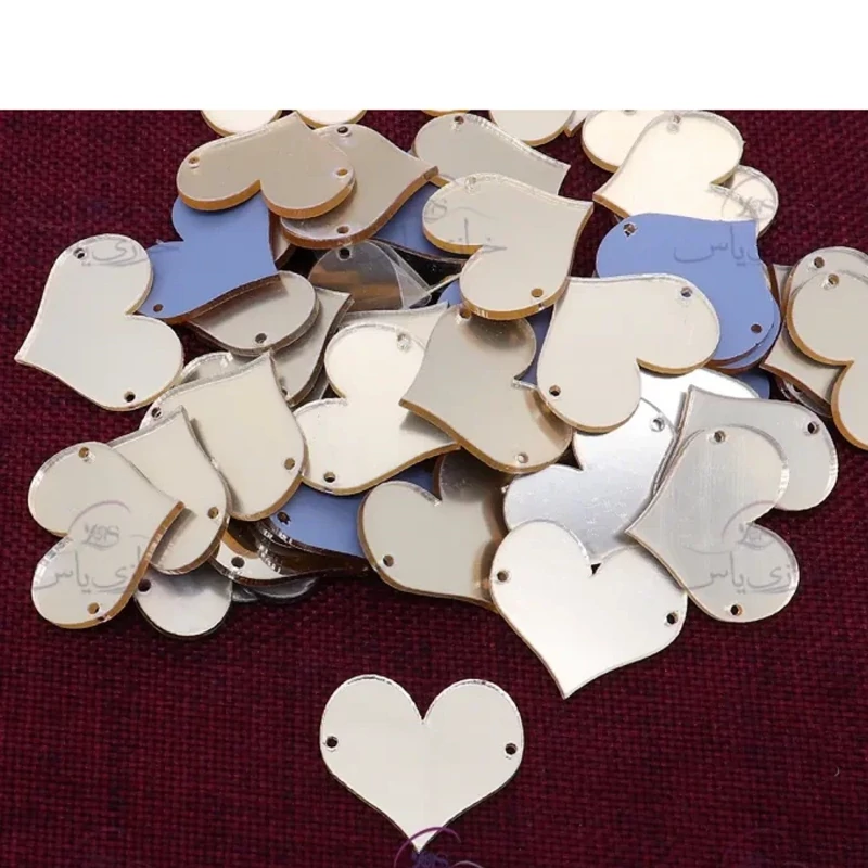 آینه دوختنی،مدل قلب،جنس مولتی استایل،دردو رنگ طلایی و نقره ای،بسته 40تایی،سایز25 میلیمتر