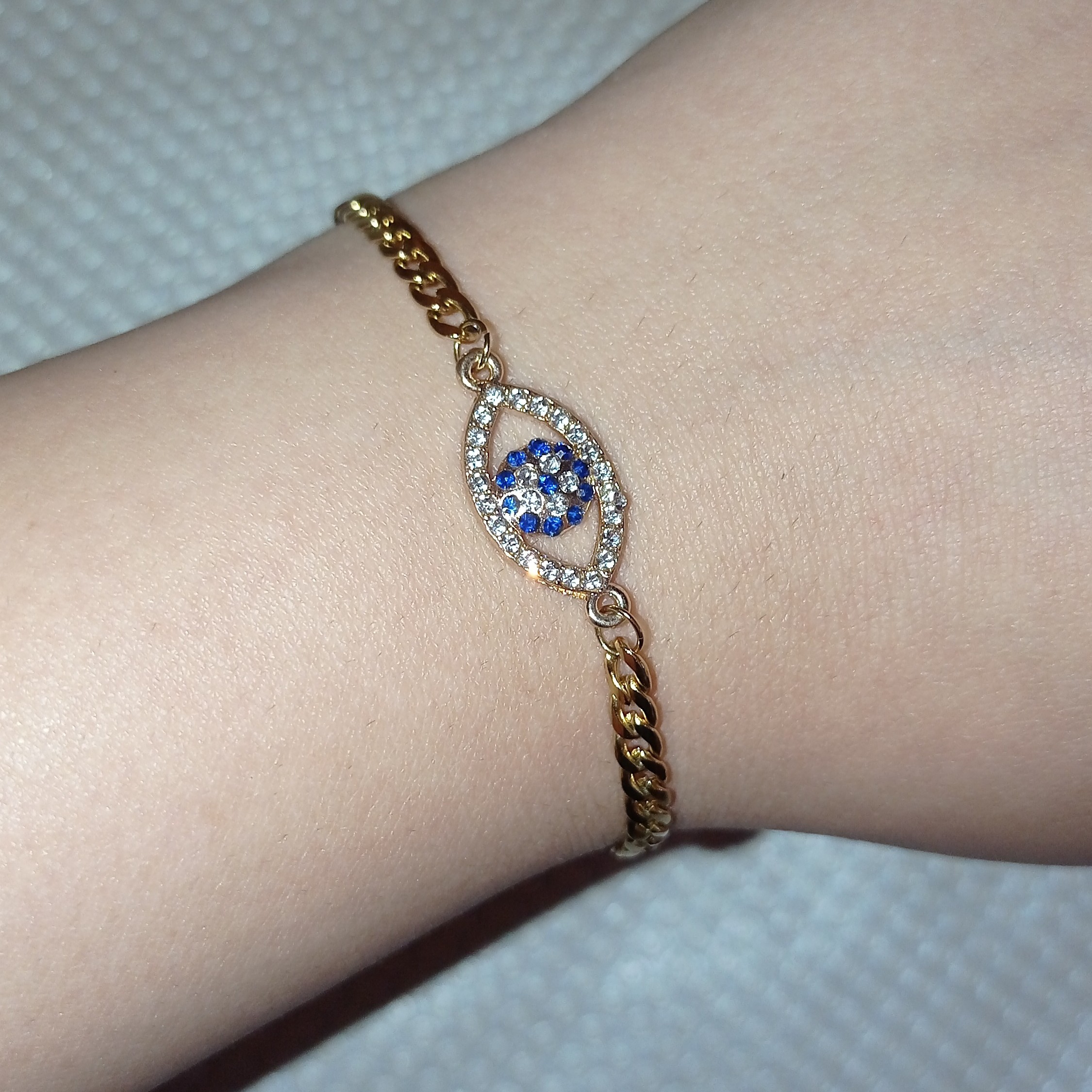 دستبند چشم نظر نگین دار با زنجیر کارتیه استیل رنگ ثابت 