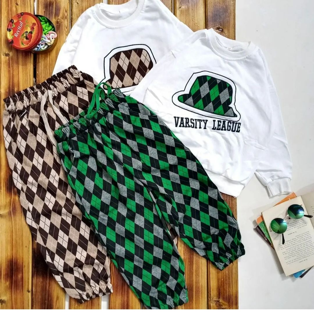 ست بلوز شلوار  اسپورت دخترانه و  پسرانه جنس بلوز  دو نخ لاکرا