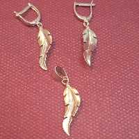 نیم ست نقره زنانه طرح پر با عیار 925 موجود در دو رنگ آبکاری زرد و سفید با ارائه فاکتور رسمی