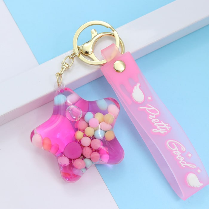 سرکلیدی شیشه ای آویز کیف آکواریومی ستاره صورتی 33854