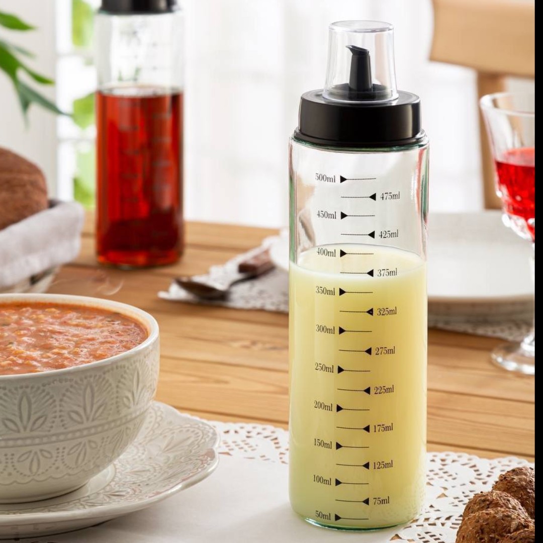 روغن ریز  500 میل شیشه درجه یک از برند آوا استیل با درب کنترل کننده روغن ریز