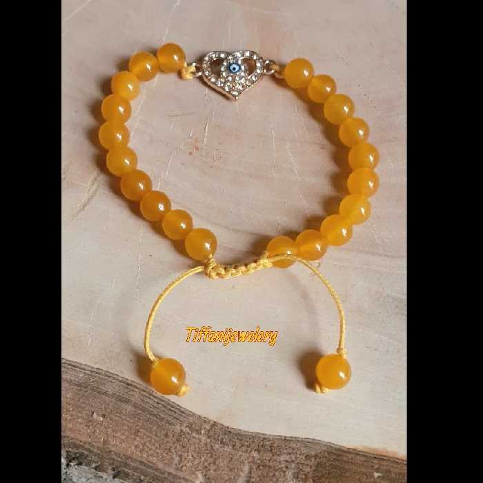 دستبند سنگ اصل عقیق با بند کشویی که به راحتی سایز آن قابل تغییر است