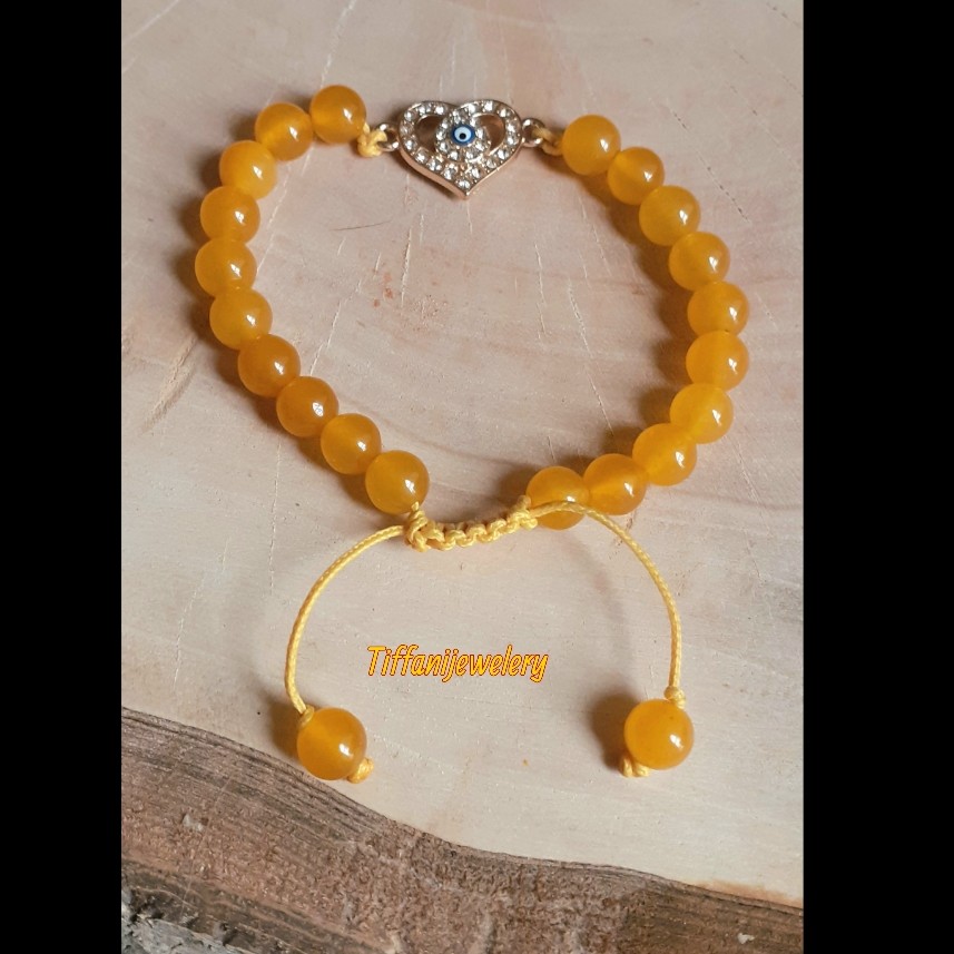 دستبند سنگ اصل عقیق با بند کشویی که به راحتی سایز آن قابل تغییر است