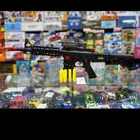 اسباب بازی تفنگ تیر چسبونکی