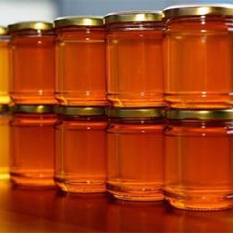 عسل بهاره مرکبات سوغات شمال با درجه خلوص بالا در ظروف 500 گرمی و یک کیلویی