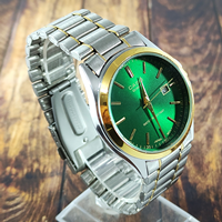 ساعت مردانه CASIO کاسیو مدل 1199 نقره ای،طلایی زمینه سبز