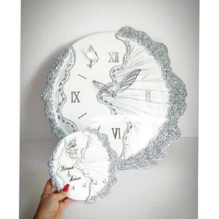 ساعت دیواری        سفید نقره ای (پس کرایه)