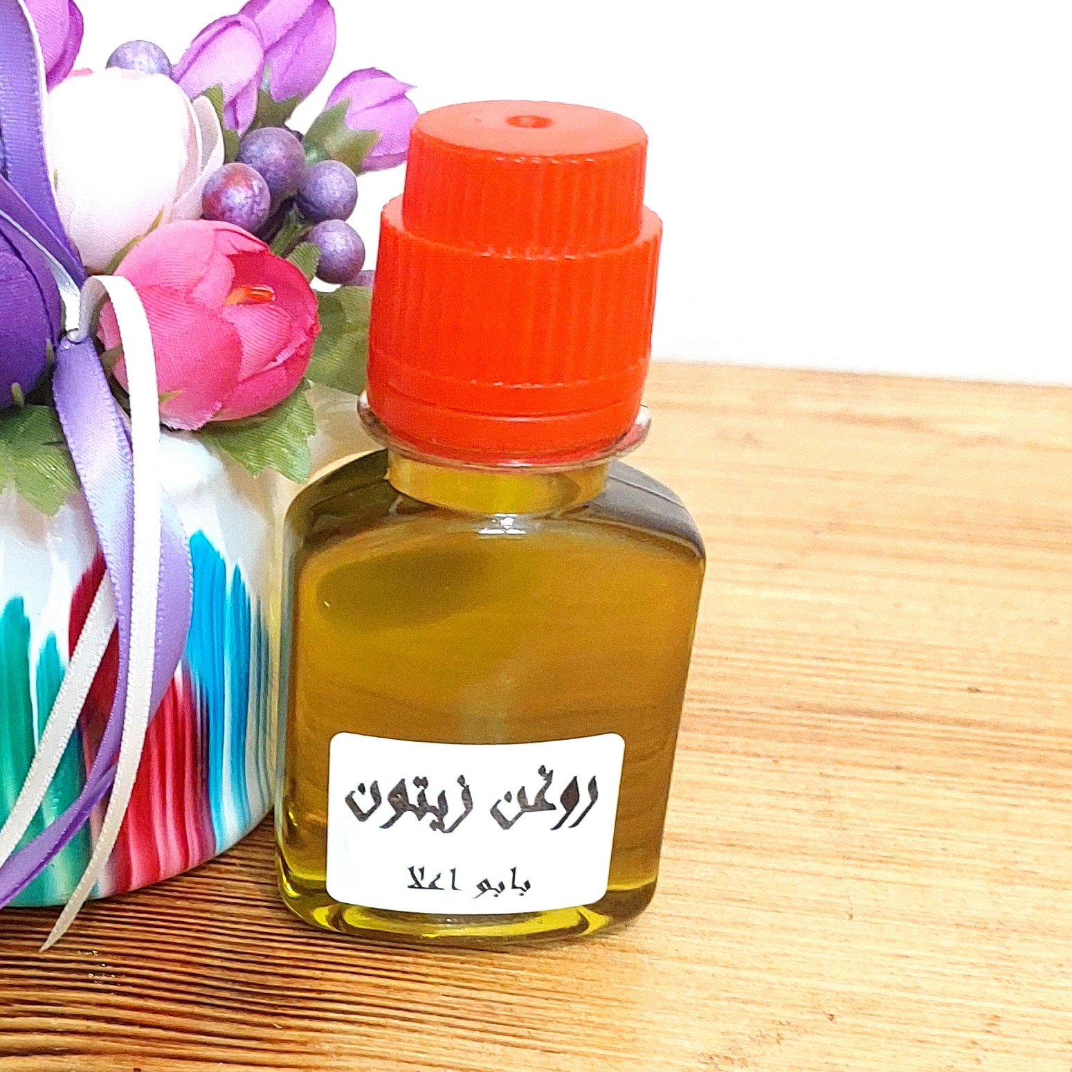 روغن زیتون با بو اعلاء سنتی 60 میل گرم(با تضمین کیفیت)