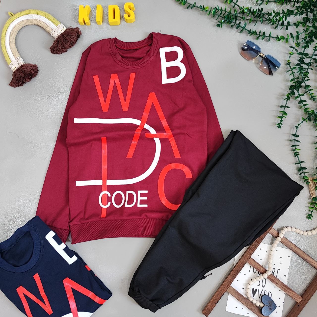 ست بلوز و شلوار اسپورت شیک و خوشگل سایز بزرگ دو رنگ زرشکی و سرمه ایی جنس دورس دو نخ عالی 