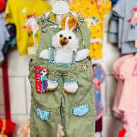 پیشبندی عروسکی کتان نوزادی تا 3 سال