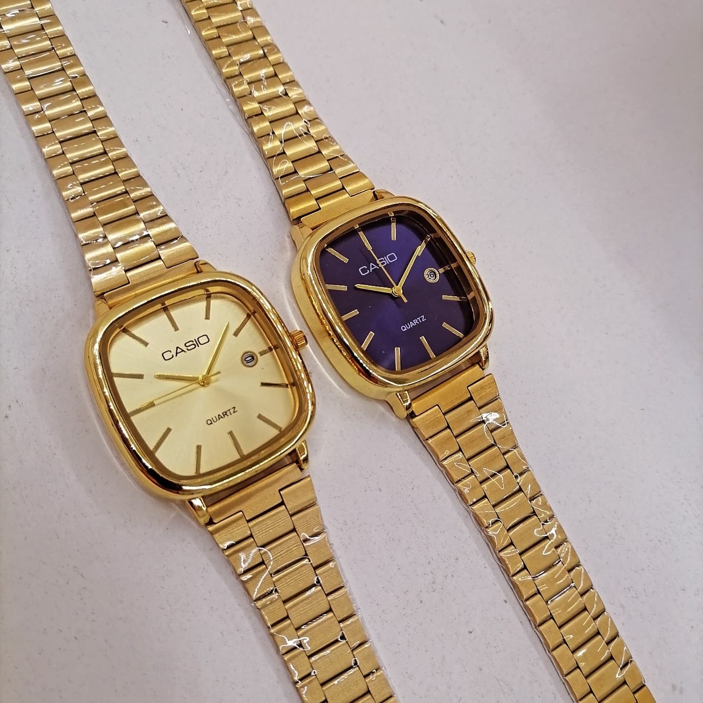 ساعت مردانه طلایی کاسیو صفحه مربع بند فلزی