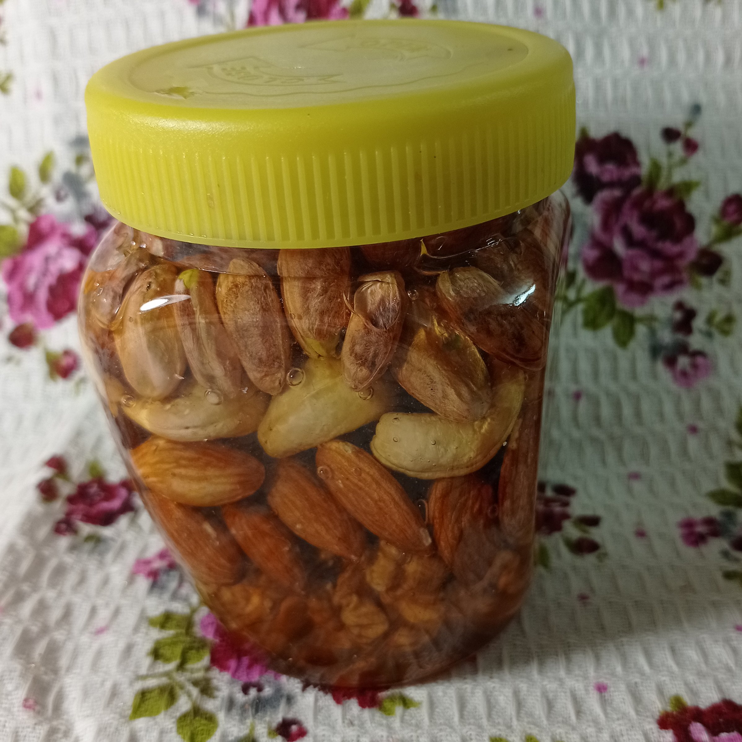 عسل آجیلی چهار مغز نیم کیلویی