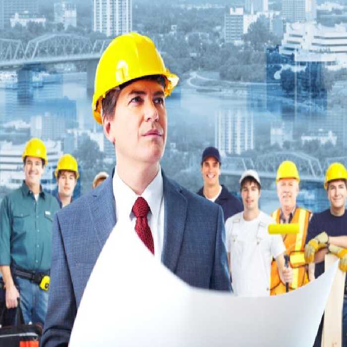 خرید و دانلود عکس مدیر پروژه ساختمانی و تیم مهندسی برای تبلیغات ساختمانی | پیک فاکس | Pic Fox