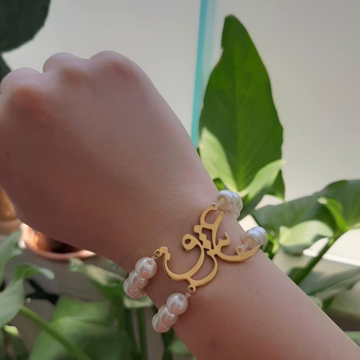 دستبند عشق مروارید با پلاک استیل