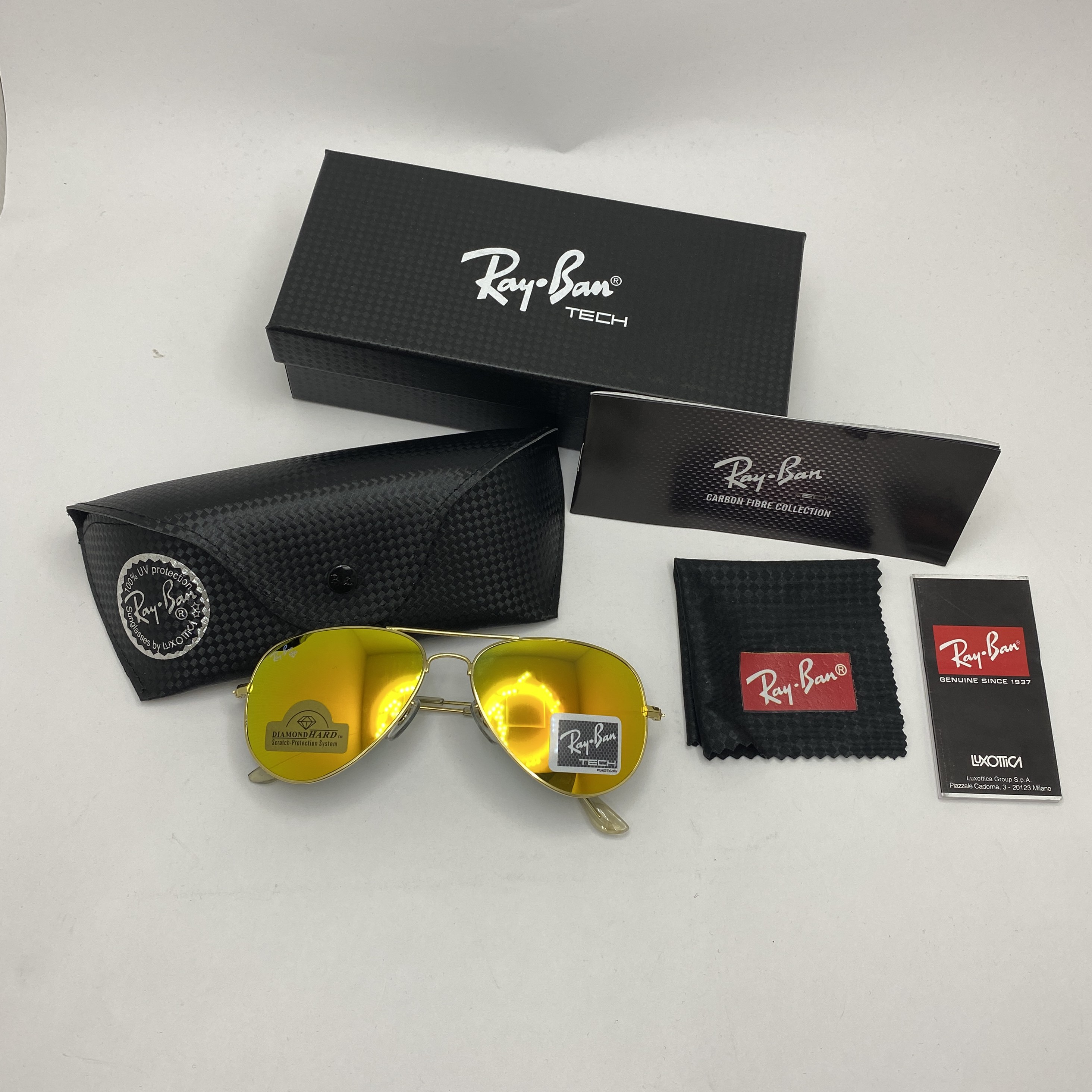 عینک آفتابی خلبانی AVIATOR ریبن reyban شیشه سنگ ایتالیایی طلایی سایز 3025 فول پک کامل اورجینال ریبن